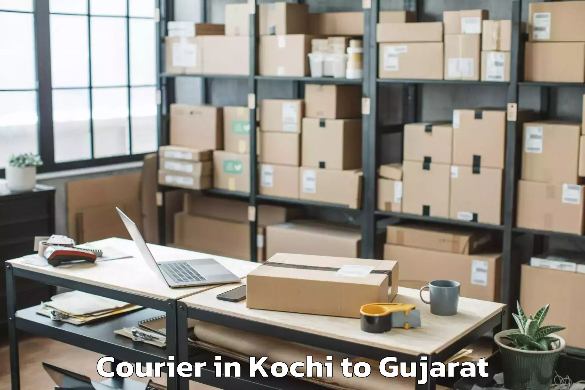 Easy Kochi to Malpur Courier Booking